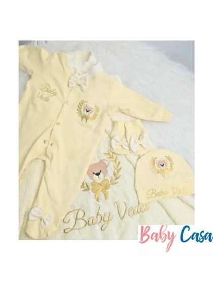 A sunny yellow set for "Baby Veda." This cheerful combo includes a personalized wrap sheet and two different romper styles, all featuring a sweet teddy bear crest.