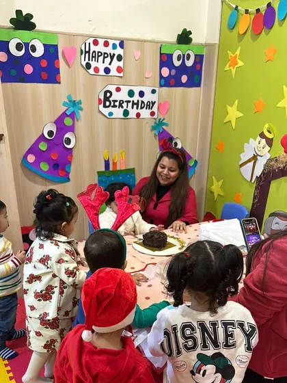 All friends gather around to sing "Happy Birthday." These moments teach children about celebrating their peers and sharing in each other's happiness.