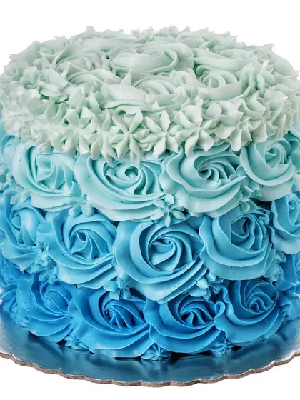 Our ombre rosette cake is a work of art, featuring buttercream roses in graduating shades of blue. This design is perfect for birthdays, baby showers, or any event where you want a visually striking dessert.