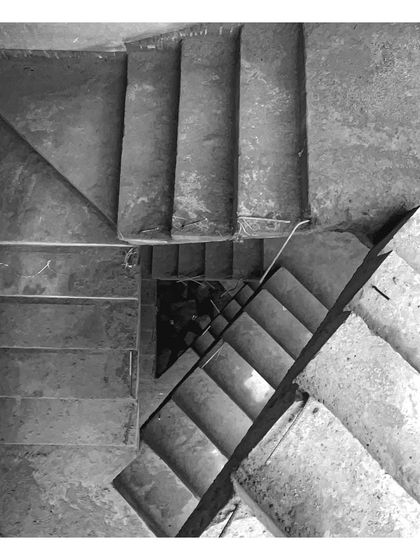A top-down view of a concrete staircase under construction at the '15B HSR' site.
