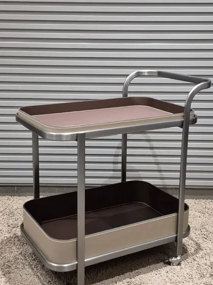 A rectangular bar cart with two spacious trays, perfect for serving drinks or displaying decor.
