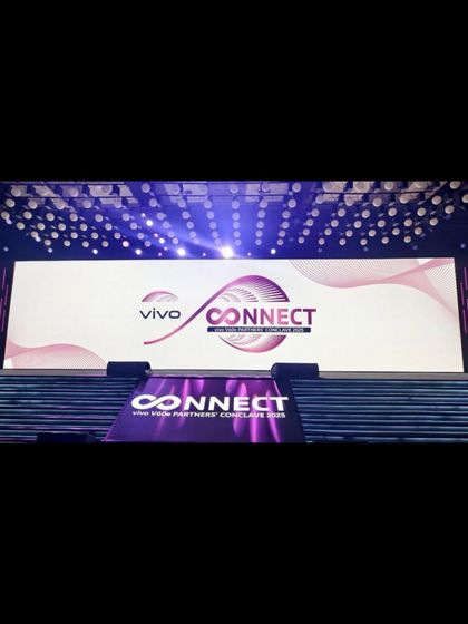 The main branding on the stage for the VIVO V60e Partners’ Conclave.