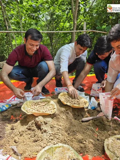A close-up of the seed ball making process. We teach the right ratio of materials to ensure the seed balls are effective and have a high germination rate.