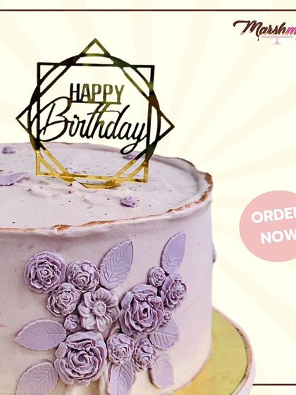 Celebrate in style with this premium Belgian chocolate cake. It's covered in a silky white chocolate ganache and decorated with delicate, hand-piped lavender flowers.