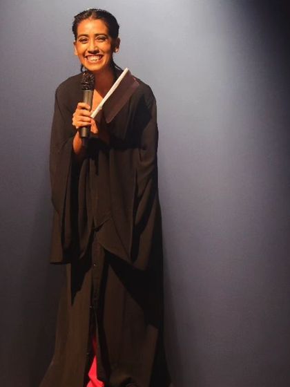 Our founder addressing the audience. Every show is a celebration of our community's talent and hard work.