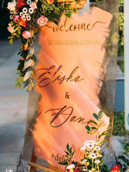 The perfect setting for a pre-wedding cocktail party or sangeet night. The lawn provides ample space for a dance floor, while the surrounding trees, lit with elegant chandeliers and string lights, create a festive and celebratory atmosphere.