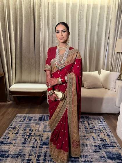 A beautiful shot capturing the bride's elegance and poise. The makeup is designed to last, ensuring she looks fresh and perfect throughout the wedding ceremonies.