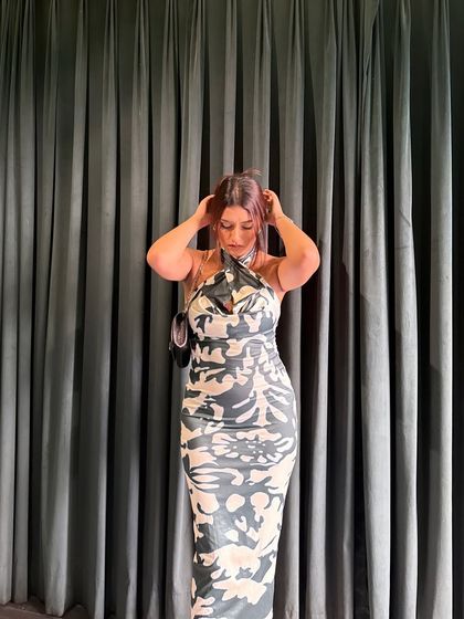 Another shot of me fixing my hair, a relatable and cute pose.