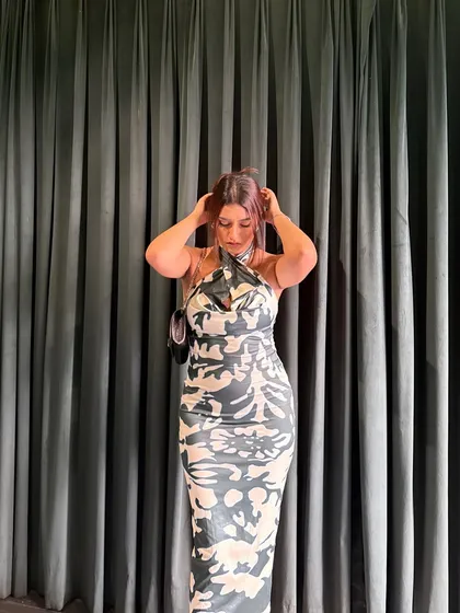 Another shot of me fixing my hair, a relatable and cute pose.