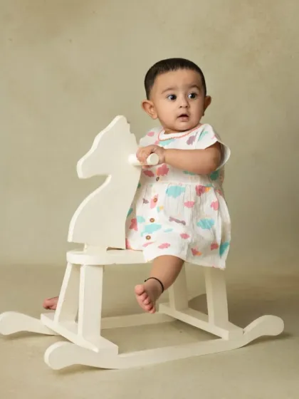 A collection of simple, classic portraits of twin babies. Without props or themes, their individual expressions and connection are beautifully highlighted.