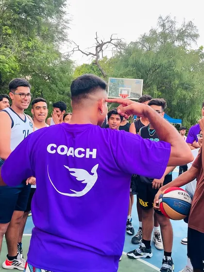 Having a laugh with the players during a workshop. It's important to keep the energy positive and fun.