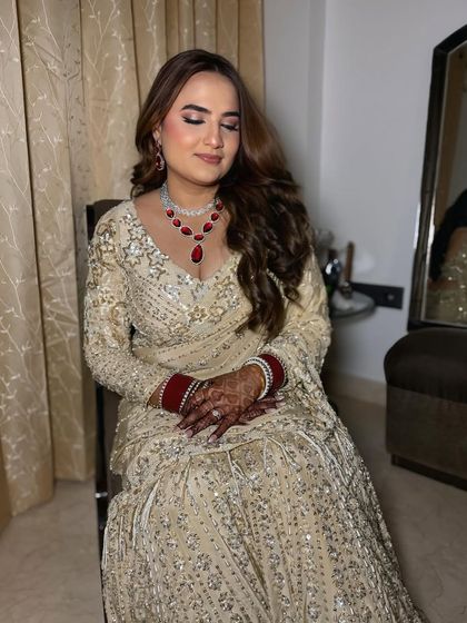 A candid moment with my reception client. The soft glam makeup with a touch of warmth looks beautiful on her.