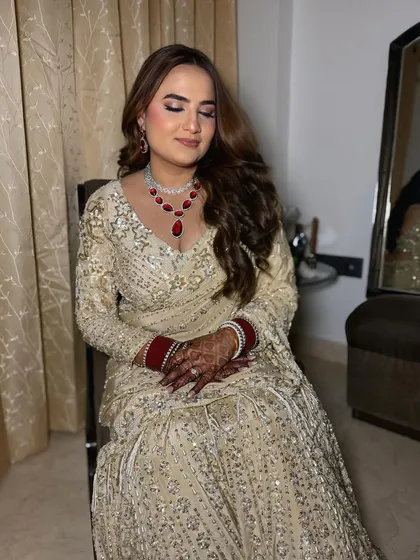 A beautiful, serene shot of my reception bride. The soft lighting highlights the dewy finish of her makeup.