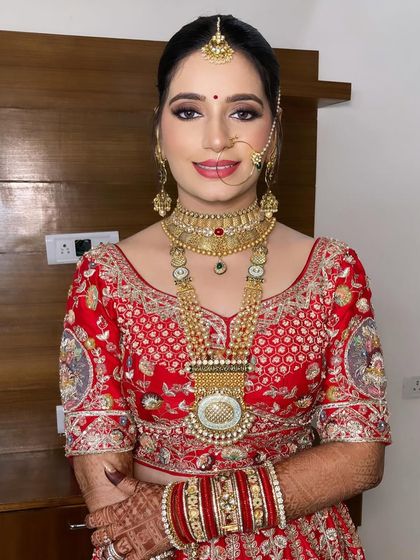 Another stunning shot of my bride Mansi, looking confident and beautiful. The classic bridal look is always a winner.