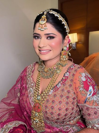 A smiling bride is a beautiful bride. This close-up captures the joy and radiance of the moment, enhanced by a fresh and glowing makeup look.