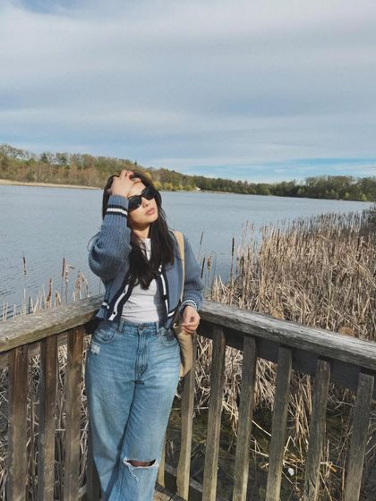 A candid moment from the Heart Lake series, with hair blowing in the wind.