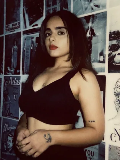 A candid, polaroid-style shot. This captures a more raw and real side of me, reflecting the authentic, no-frills vibe of my music and persona.