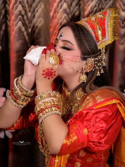A powerful Navratri-themed portrait of a model as Durga, blowing a conch shell (shankh).