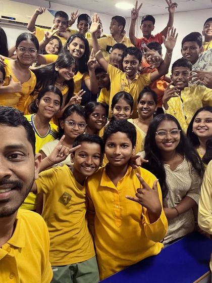 Another energetic group photo celebrating the yellow color day of Navratri. These moments make our classes feel like a second home.