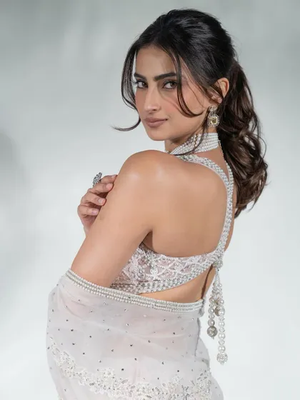 A backstage portrait of Palak Tiwari at Bombay Times Fashion Week. The clean background and soft lighting capture the elegance of the moment.
