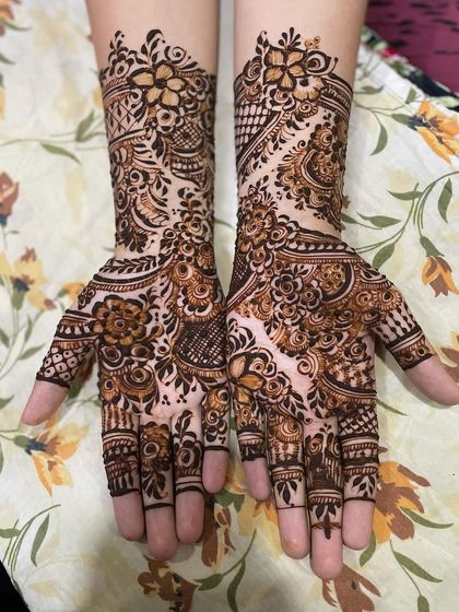 Intricate Full Hand Mehendi photo 3