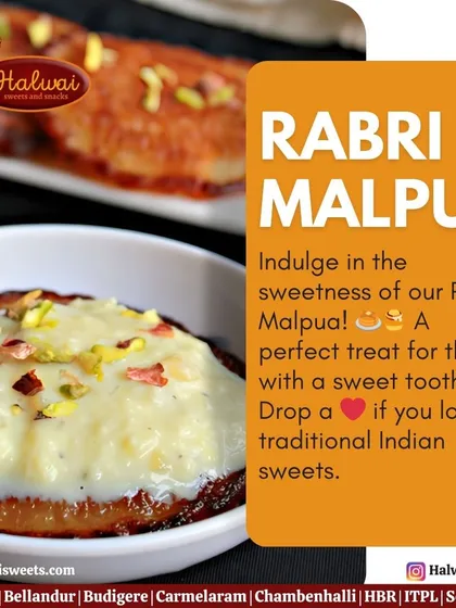 Indulge in the sweetness of our Rabri Malpua, a perfect treat for those with a sweet tooth. These fried pancakes are soaked in sugar syrup and topped with creamy rabri.