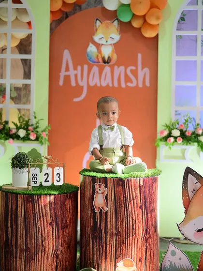 The birthday boy, Ayaansh, enjoying his special jungle themed setup. I design these spaces to be not just beautiful for photos, but also fun and engaging for the little ones.