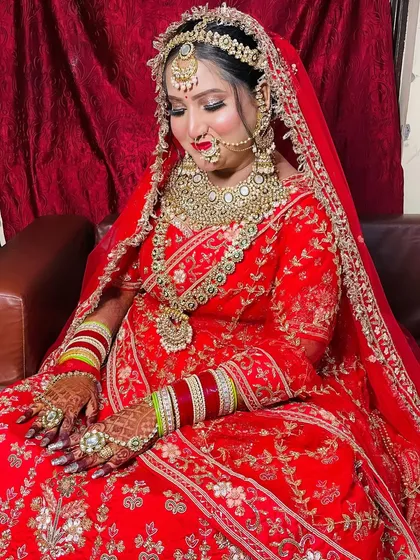 A final look at this regal bride. The combination of traditional attire and flawless makeup creates a timeless and unforgettable image.