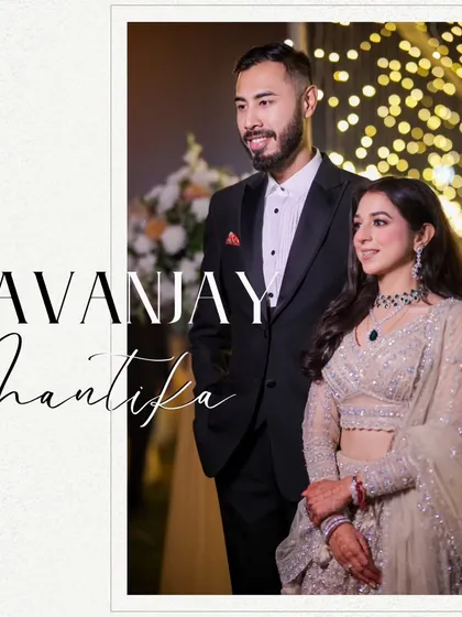 A classic, elegant portrait of the newly engaged couple. This shot, taken at the Gymkhana Club Delhi, captures their sophisticated style against a backdrop of beautiful bokeh lights.