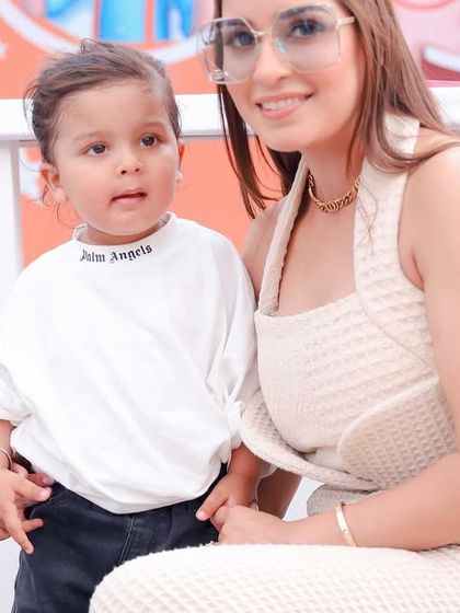 A lovely photo of mother and son at his second birthday party. We make sure to get individual portraits of the parents with the birthday child.