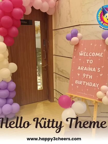 The welcome sign is the first thing guests see, and for this Hello Kitty party, I created a custom sign on an easel, decorated with a small balloon garland to match the pink and purple theme.