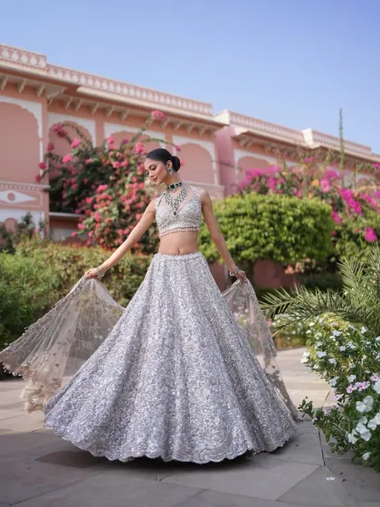 A fairytale moment in a shimmering silver lehenga. I love creating dreamy, modern looks that feel light, magical, and perfect for a bride who wants to twirl the night away. It’s all about capturing that feeling of effortless grace.