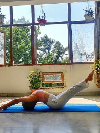 Another view of Matasyasana, showing the full extension of the spine. This pose is excellent for counteracting the effects of slouching and opening up the body.