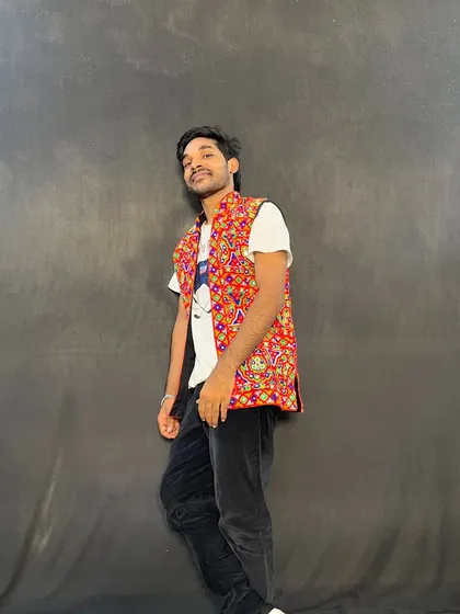 A simple, stylish pose showing the traditional attire for Garba.
