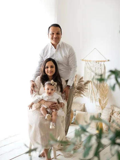 A classic family portrait from a 6-month milestone session. It's so important to get the whole family in the picture to mark these special occasions.