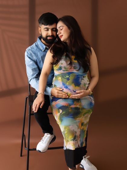 An intimate and modern couple's portrait, capturing a quiet moment of connection in a contemporary style.