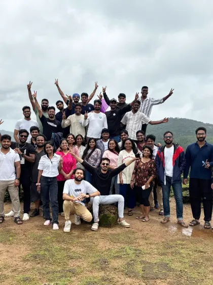 A big, happy group celebrating together at a viewpoint. This is the spirit of a MAC trek.