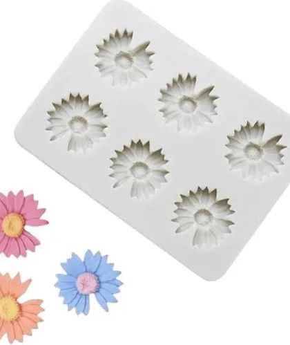 This 6-cavity daisy mold is perfect for creating small embeds for larger candles or for making cute, individual flower soaps.