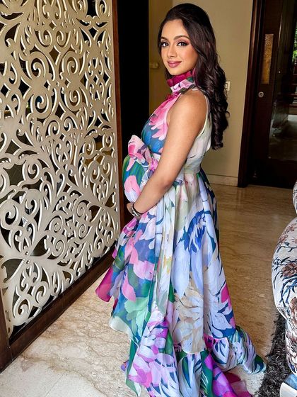 A dewy, soft glam look for a beautiful mommy-to-be at her baby shower. The makeup is fresh and radiant, designed to enhance her natural pregnancy glow.