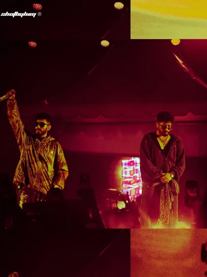 Seedhe Maut on stage in Bangalore, bathed in dramatic red light. This shot captures the raw, unfiltered energy of their live hip-hop performance.
