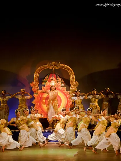 Our event coverage extends to cultural performances and entertainment. This vibrant, well-lit photograph of a large group dance performance demonstrates our ability to capture dynamic action and artistic moments with clarity.