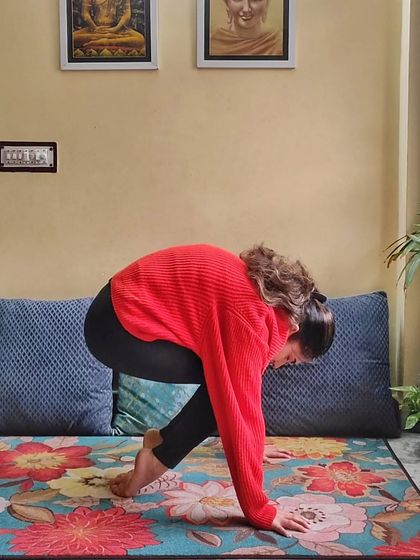 Lolasana, or pendant pose, is a challenging arm balance that requires immense core strength. In my classes, we build up to poses like this with drills and preparation, learning that it's okay to fall and get back up.