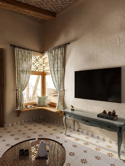 A close-up of the corner window nook, a perfect spot to feel connected to the outdoors while being sheltered in comfort. The elegant console table adds a touch of classic style to the rustic space.