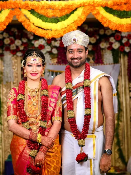 A timeless portrait of the bride and groom in their full wedding attire. This is the classic photo that will be treasured for generations.