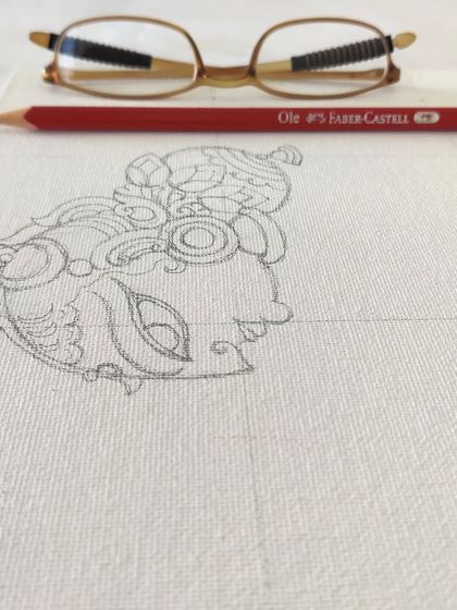 A duplicate of the initial Krishna head sketch.