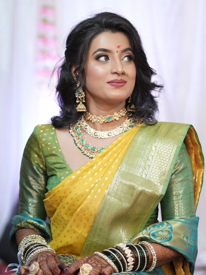 Unique caption for media id 134 describing the specific jewellery and look.