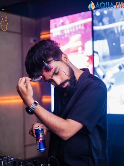 Taking a quick Red Bull break during my Halloween set. Keeping the energy high for a themed party requires some extra fuel.