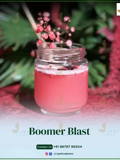 The 'Boomer Blast' is a perfect blend of flavors in every sip. This pink-hued drink, served in a cute jar, is a fun and nostalgic choice for any party.