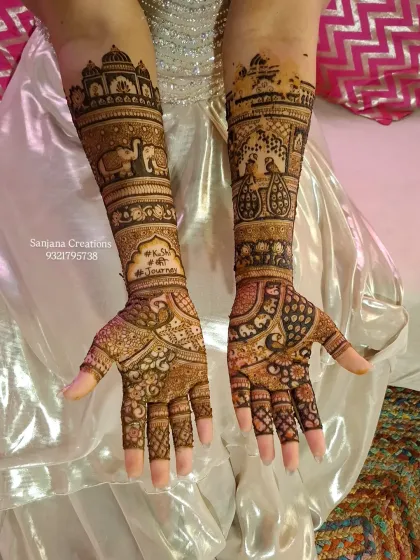 This is what a bride's dream mehndi looks like. We included everything that told her story: portraits of her and her partner, majestic elephants for royalty, and palace architecture inspired by their wedding venue. Every single detail was planned to make her feel like a queen.
