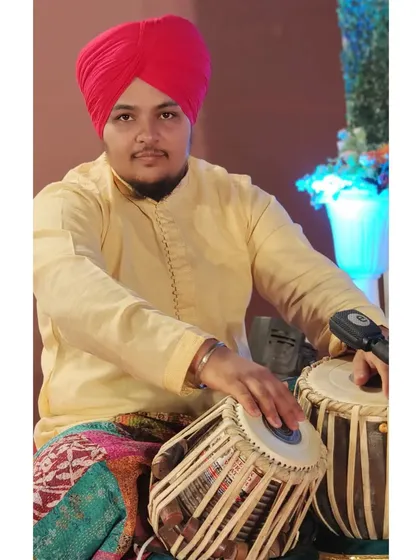A moment captured during a performance in Pandharpur. The focus and concentration required for a live classical show are intense, but the reward is a shared musical journey.